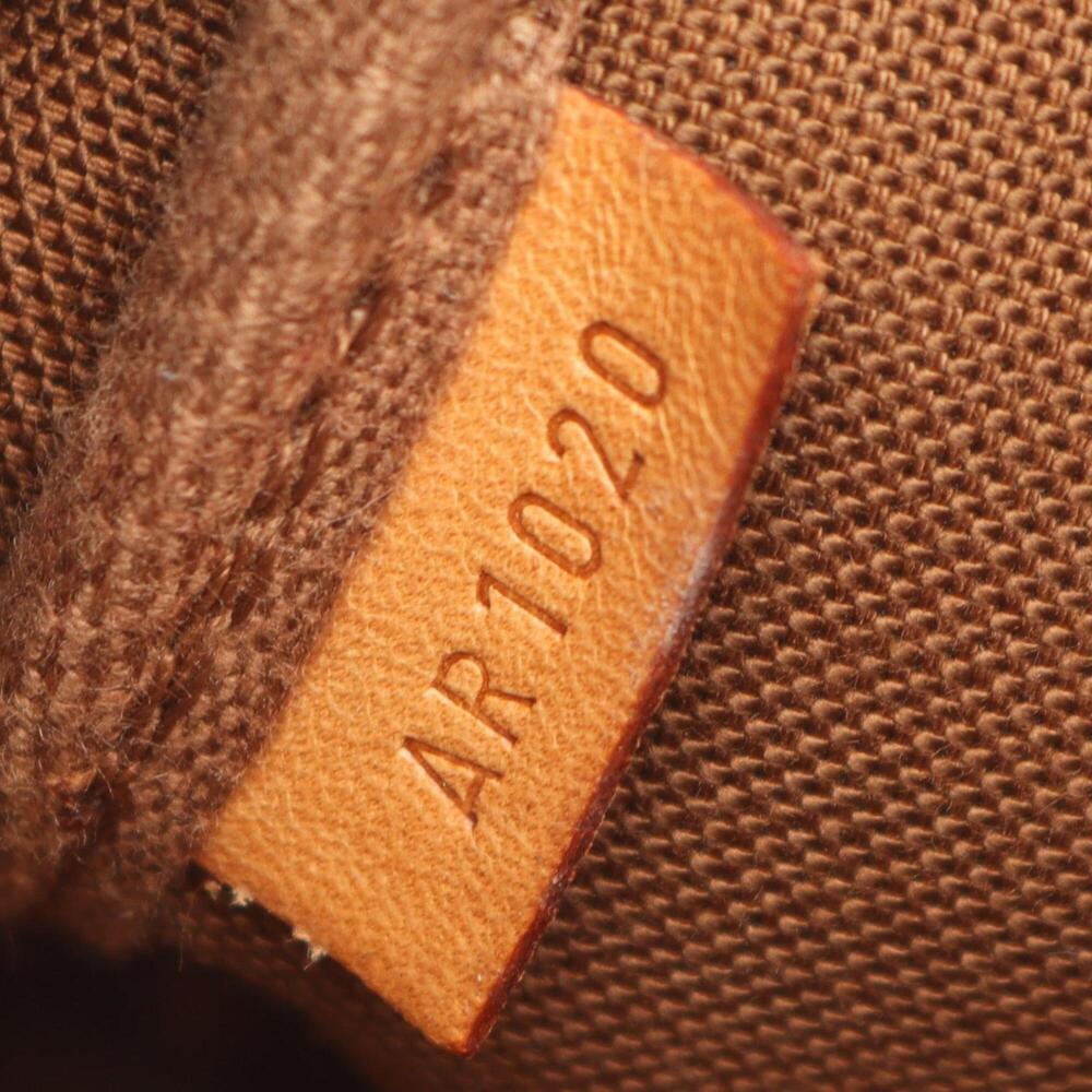 LOUIS VUITTON Authentic Brown Monogram Leather Pochette Bag - Picture 5 of 11